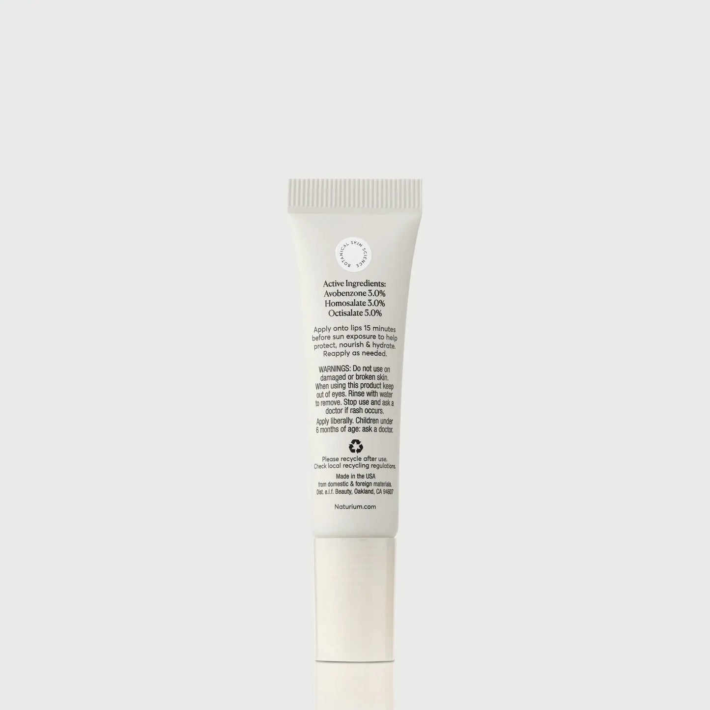 phyto-glow-lip-balm-spf-45-clear-c8 NATR-10124_PhytoGlow_SPF_Clear_primary_capon_back_bonebkgd_1.webp