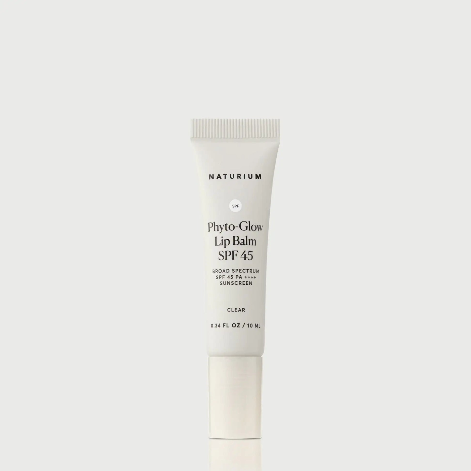 phyto-glow-lip-balm-spf-45-clear-c8 NATR-10124_PhytoGlow_SPF_Clear_primary_capon_front_bonebkgd_1.webp
