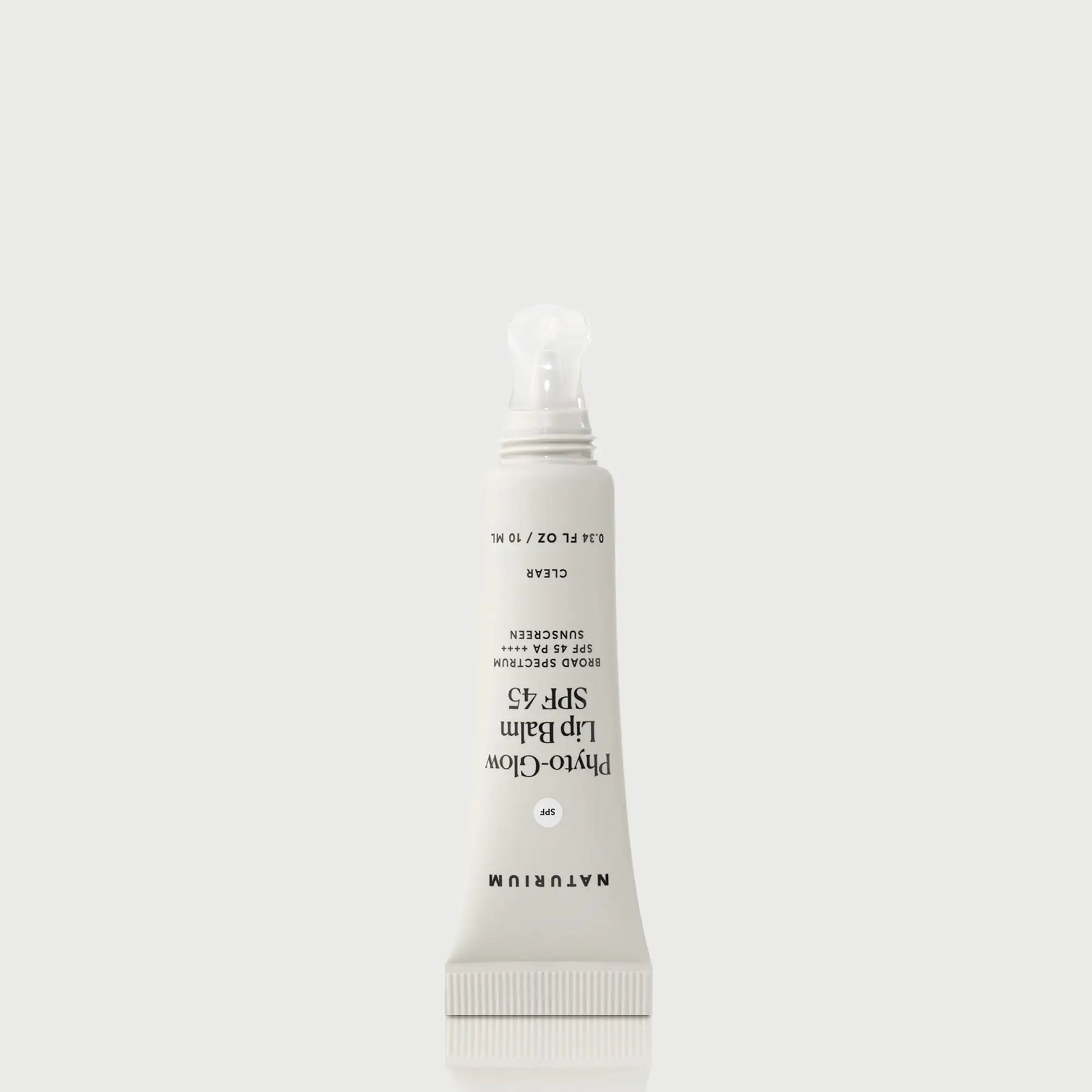 phyto-glow-lip-balm-spf-45-clear-c8 NATR-10124_PhytoGlow_SPF_Clear_primary_nocap_bonebkgd_1.webp