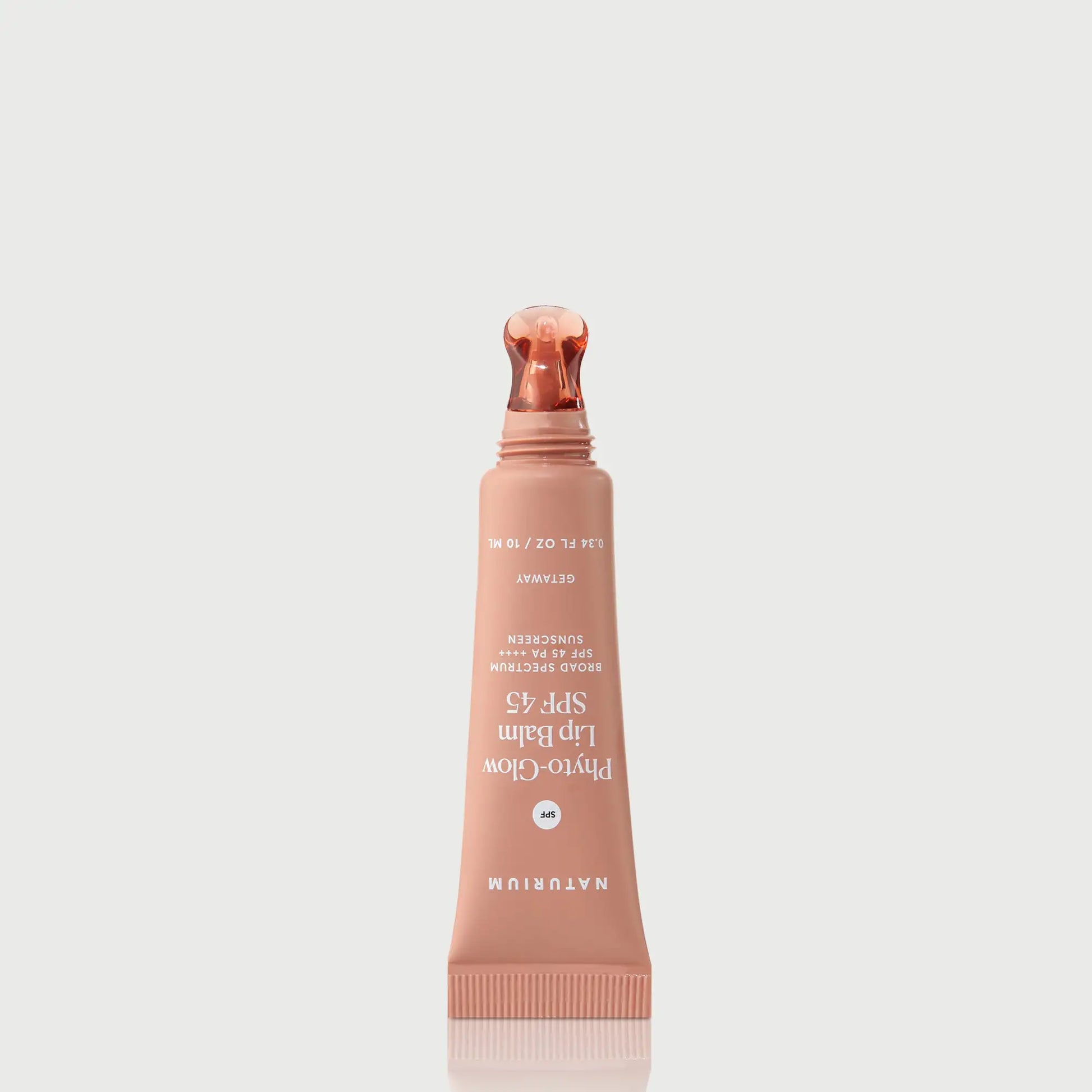 phyto-glow-lip-balm-spf-45-getaway-b3 NATR-10126_PhytoGlow_SPF_Getaway_primary_nocap_bonebkgd_1.webp