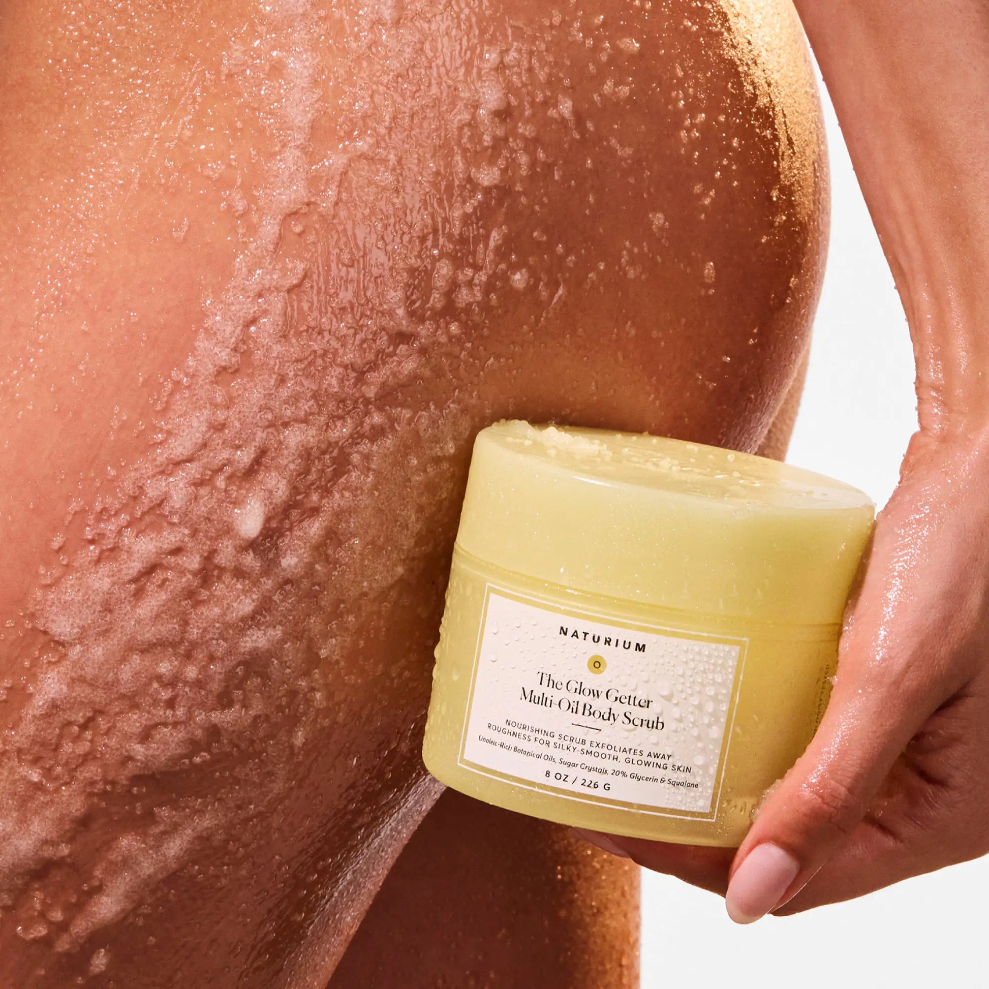 the-glow-getter-multi-oil-body-scrub-u1 NATR-40028-Alt-Image-The_Glow_Getter_Multi-Oil_Body_Scrub-07.webp