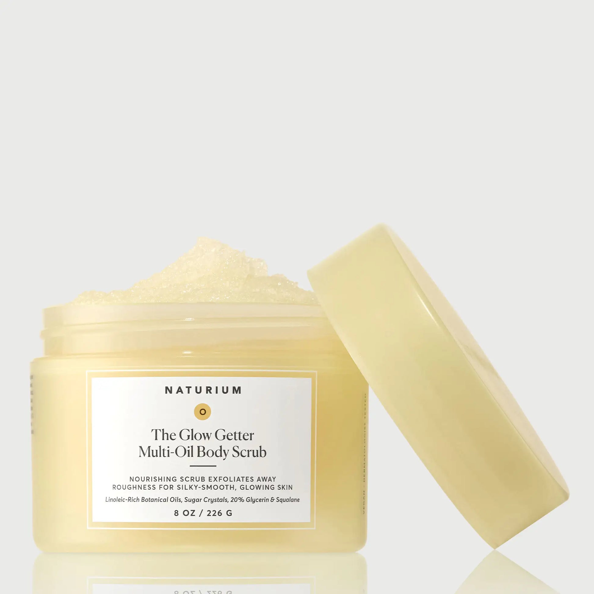 the-glow-getter-multi-oil-body-scrub-u1 NATR-40028-GlowGetter-Multi-Oil-Body-Scrub-Front-CapOff-bonebkgd.webp