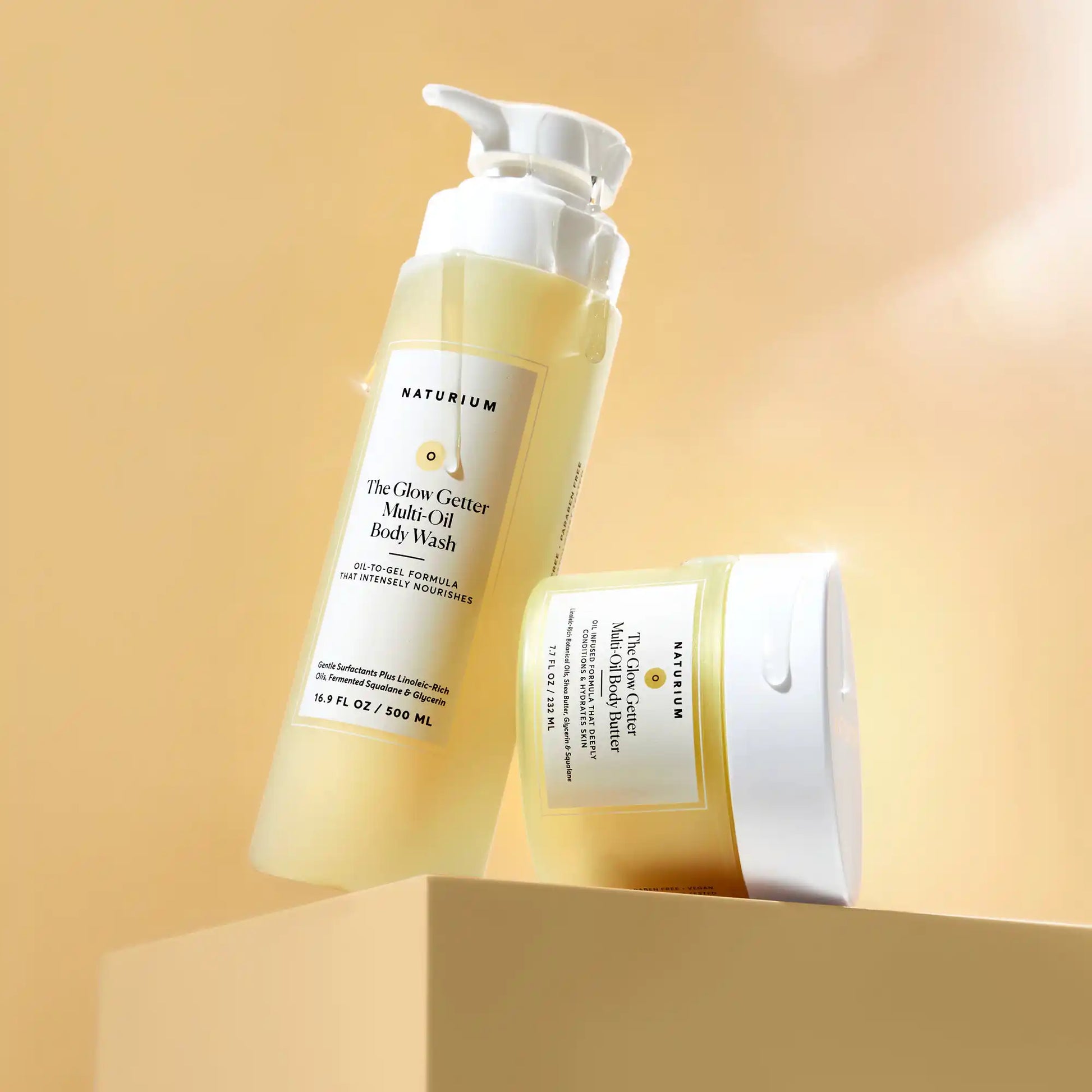 the-glow-all-out-body-bundle-r0 gg-bodybutter_1464-crop_revcolor_FL.webp